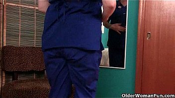 Busty grandma in nurse uniform and stockings masturbates